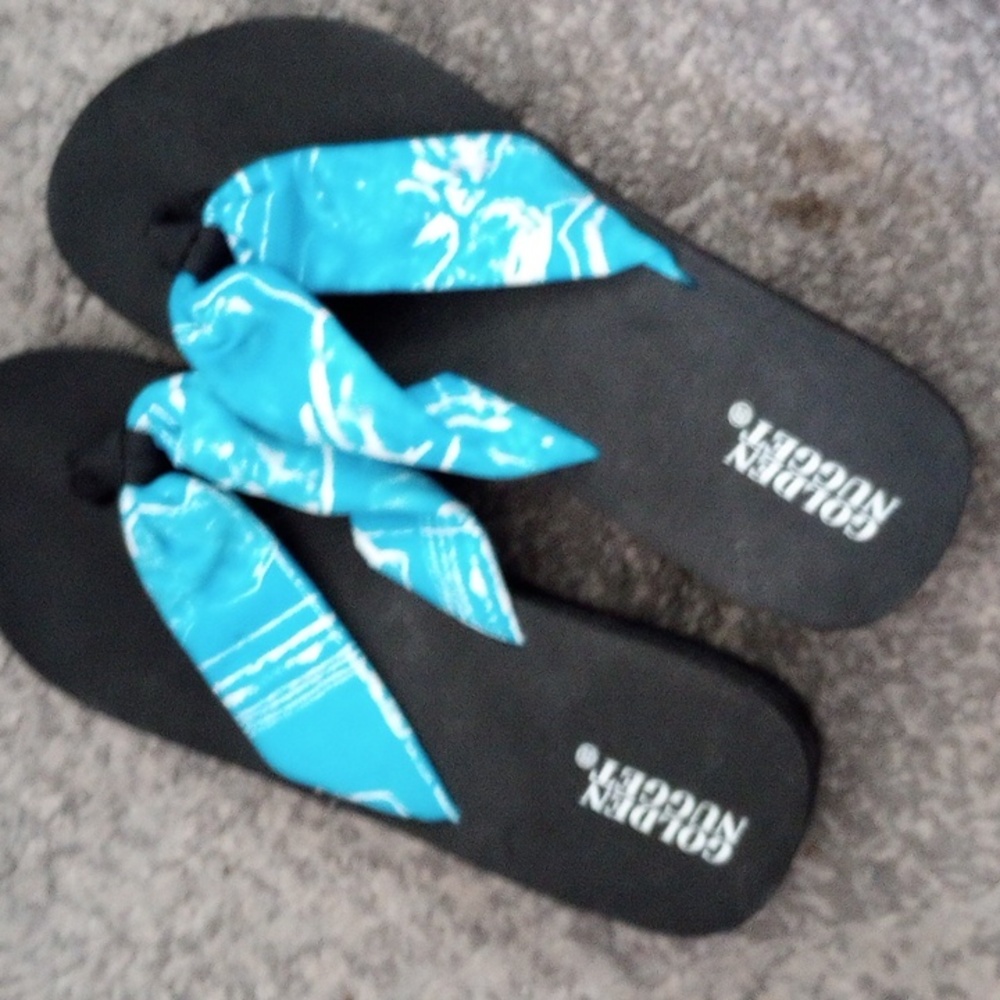 Size 7 golden nugget flip flops